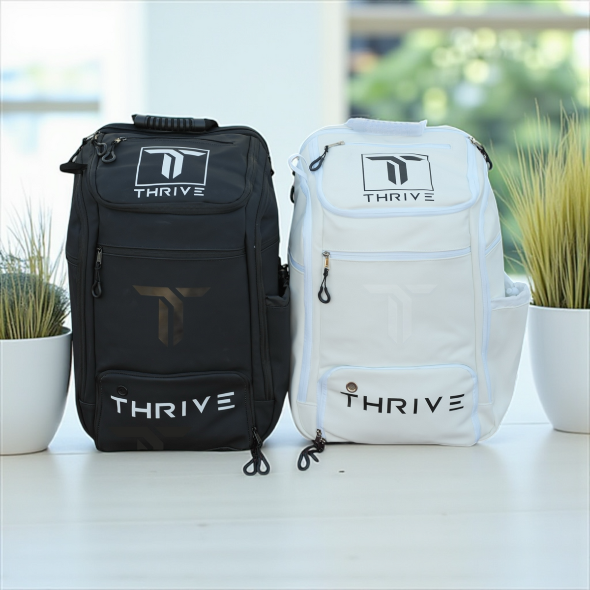 Thrive Elite Hybrid Tour Backpack - BLACK